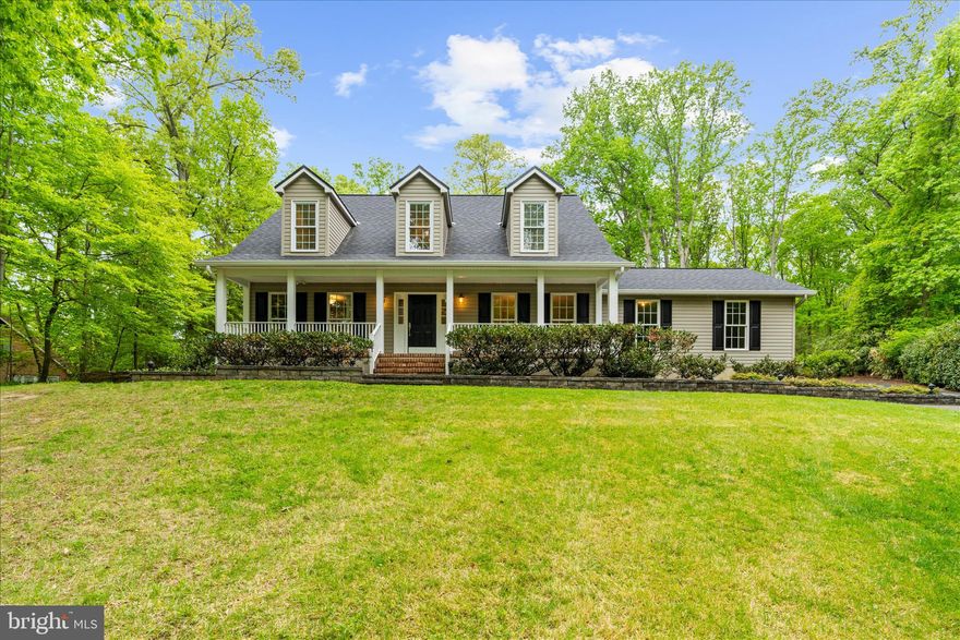 A private retreat in Davidsonville offering space, comfort, and convenience.
This beautifully maintained, custom-built home offers 4 bedrooms, 3 full baths, and 1 half bath, perfectly sited on a private, peaceful cul-de-sac lot surrounded by natural beauty. Designed for both everyday living and effortless entertaining, the home features a thoughtfully updated kitchen with new countertops and a stylish tile backsplash. The upper-level primary suite provides a true retreat, complete with a walk-in closet and the convenience of an in-suite washer and dryer, while two additional bedrooms complete the upper level.
The lower level offers a private suite with kitchenette, ideal for guests, extended stays, or flexible living arrangements. An additional washer/dryer hookup is also available in the lower level. Step outside to a picturesque backyard retreat featuring a fire pit—perfect for quiet evenings or gathering with friends. Distinctive architectural details, including charming metal-roofed dormers, enhance the home’s character, while electric service to the shed adds versatility for hobbies or storage.
Recent upgrades include a roof (2024), 2 HVAC systems (2025), and whole-house generator (2022), providing peace of mind and modern efficiency. Ideally located with convenient access to Annapolis, Baltimore, and Washington, D.C., this exceptional property offers the perfect balance of privacy and accessibility.