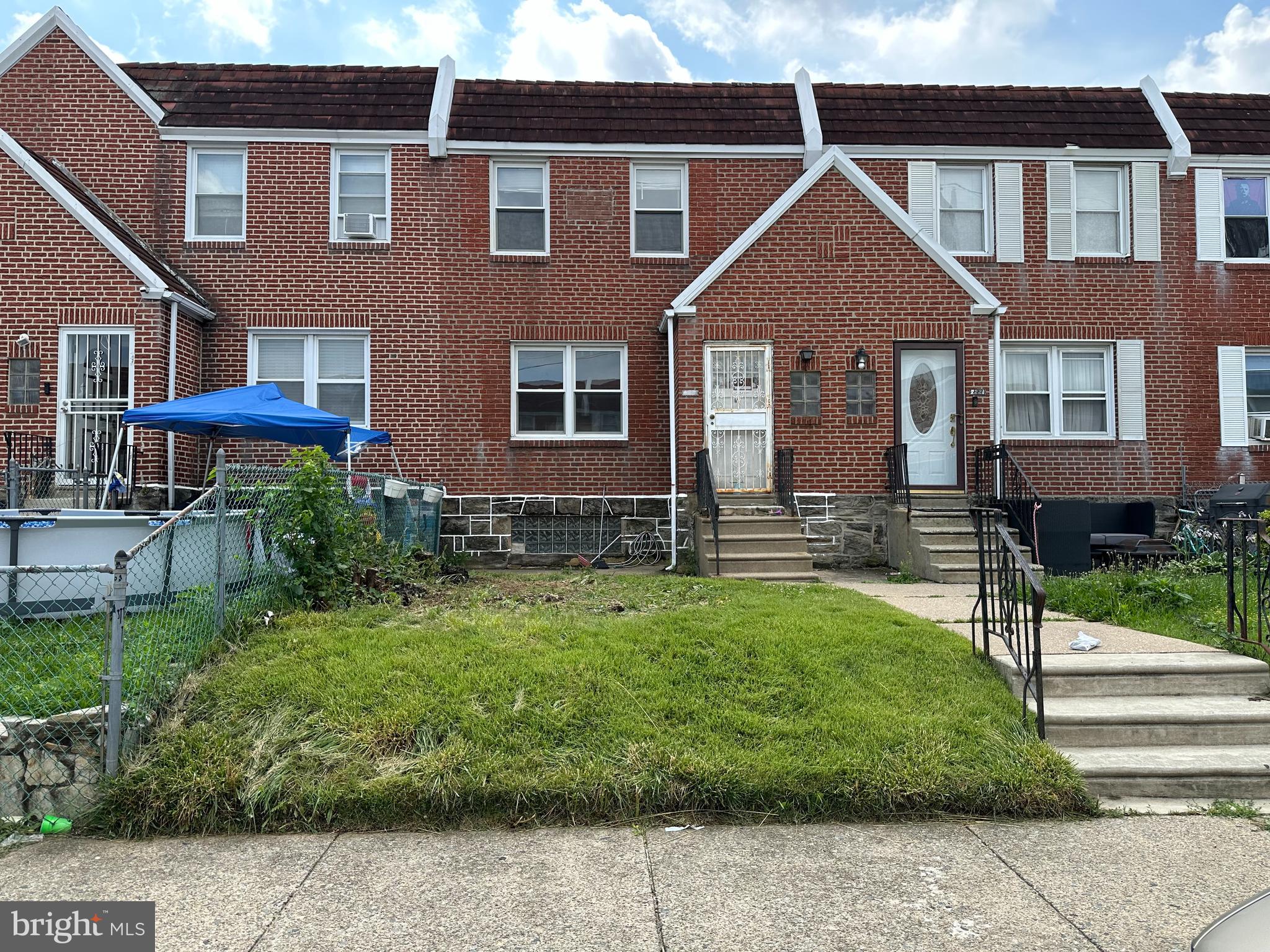 Spacious 2 Sty Brick Row located half a block to Roosevelt Mall and easy access to Roosevelt Blvd. Property offers 3 Spacious Bedrooms, 2 Full Baths, Central A/C, attached garage & Backyard driveway. Easy to Show!
