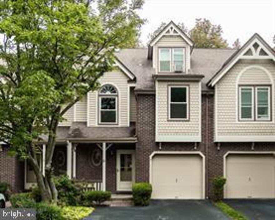 Spacious four-bedroom townhome in Main Street Village featuring a finished walk-out basement. This home offers four levels of living space, including two full bathrooms and two half bathrooms. The living room boasts beautiful hardwood floors and a cozy fireplace, while the dining room also has hardwood flooring and is equipped with stainless steel appliances. The main level includes a walk-in closet and a full bathroom with a stall shower. The second floor features three bedrooms and two full bathrooms. On the third floor, a loft with closets can serve as a fourth bedroom. The lower level includes a bright garden-level basement with direct outdoor access, a half bathroom, and a storage area. Enjoy the comfort and convenience of this well-maintained townhome. Available now.   Need 48 hours' notice because the current tenant wants.