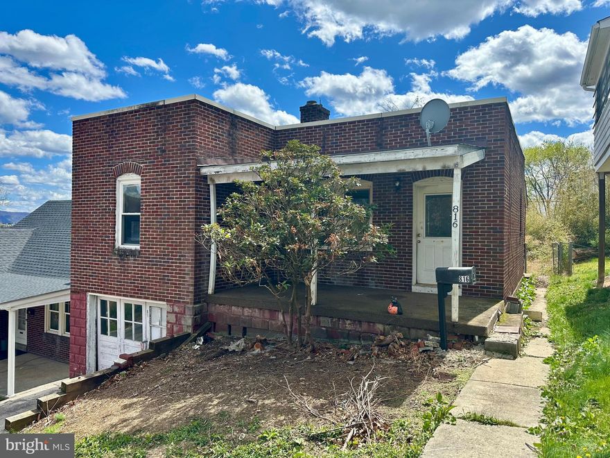 Calling all investors!! Walking distance to Braddock Middle!  One level living in need of some TLC, offering 2 bed, 1 bath, dining, kitchen, living and sunroom!  Hardwood floors throughout.  Full size basement.  New water line installed, newer panel box. Offers off street parking with 1 car attached garage.