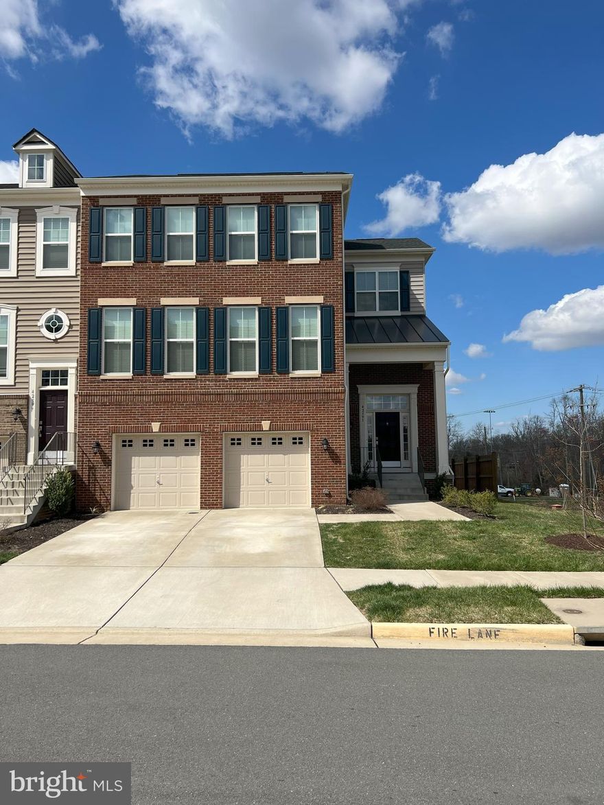 Welcome to a 6yr young, well appointed, glorious  sun filled, spacious end unit townhome. Enjoy the oversized recreation space on the lower level with a bedroom & full bathroom, access to garage, and a walk-out to the backyard. Open layout on the main level with a large island, stainless steel appliances, and ample counter space in the kitchen. The top level is where you will find the laundry room, a hall bathroom, and the remaining 3 bedrooms, which includes the spacious, light filled primary bedroom, Bathroom with sanding shower, tub  two separate sinks and bedroom has a large walk-in closet. Commuter's dream with a bus stop right in front of the community, only 2 miles to the new Ashburn Metrorail Station, easy access to Dulles Greenway, and only 10 min to Dulles International Airport by car. Only minutes to Briar Woods High School. Enjoy Brambleton Park, golf course, movie theatre, shops, restaurants, and grocery store all within about a 2 mile radius.