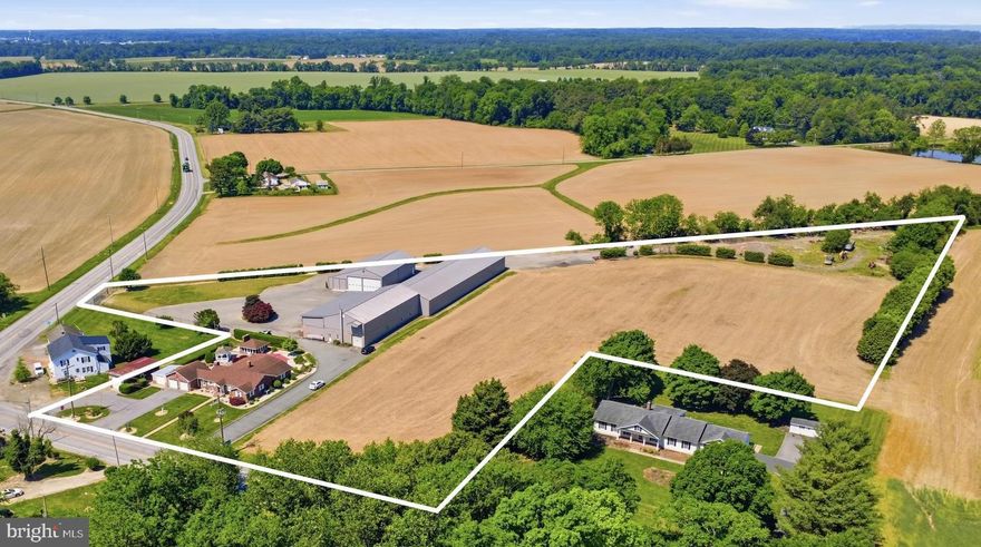 Versatile commercial property, featuring just over 23,000 sq ft of workshop and/or warehouse space on 6.71 acres. Conveniently located on 298, just over 30 minutes to Middletown, Delaware, under an hour to Wilmington, and just down the road from Chestertown and Galena. 

The newest workshop was constructed in 2021. Featuring 13’ high rolling doors, concrete floors, insulated walls, and a pellet stove for the winter.  The original workshop building has a second-floor loft, bathroom, and separate rooms that could facilitate multiple offices. The roof was replaced and exterior walls painted in 2021. The addition next to the original building was completed in 2014. This section features 4 bays with 11’ rolling doors and 3,000 sq ft of space. Lastly, the 118’ x 48’ storage room can house almost any kind of farm equipment. The additional acreage is currently farmed. 
Enter from either 298 or Still Pond Rd. Plenty of parking and easy drive-through or turn-around space for trailers. 
A rare commercial find in Kent County with ample potential! 

Opportunity to purchase the residential home in conjunction with the commercial property. 12296 Still Pond Rd is a spacious 3-bedroom, 2.5 bath, brick house with an updated kitchen, bathrooms, attached garage, and additional outbuildings. The home features a dedicated dining space, living room, a bonus room that could be used as an office or den, and a 3-season back porch. 
**The commercial property and residential home are listed for $2,475,000.
Showings by appointment only- do not enter property without scheduled appointment