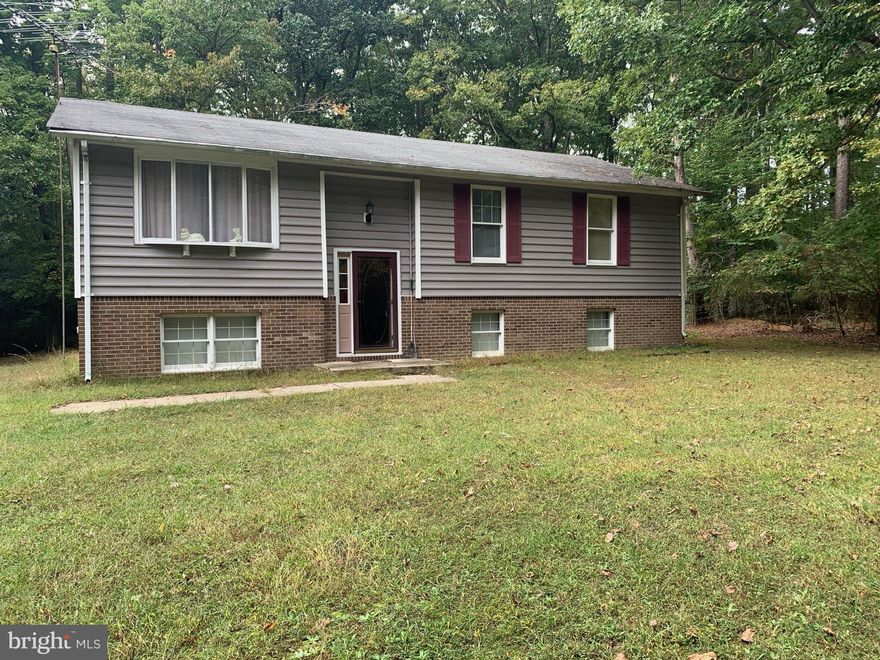 Location, Location, Location. Well kept  3 Bedroom,  2 Bathroom  Single Family Home nestled  on 1.7 acres. Home boast a niced size eat in kitchen  and spacious living and dining area. All bedrooms are on the first level and have great space for a bedroom suite.  Driveway has a private entrance located off Dowell Rd. 2 minutes from  Solomons  Island Rd Route 4. Minutes from Solomons Island,  Marina and Beach area. Walking distance to Solomons Town Center Park.