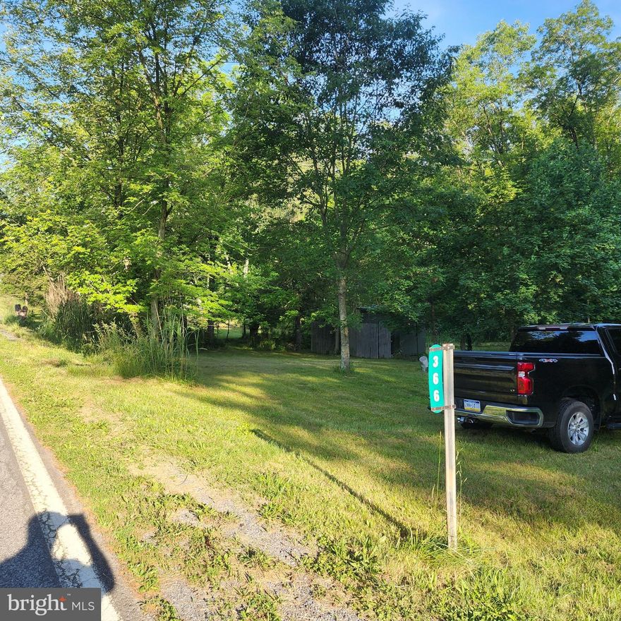 .33 of an acre.  Recently used for  family campground.  There were 2 campers on this lot.  Owner had a solar pump for the well and 3 hoses connected to the well.  One for each camper and another for miscellaneous use.  Electric lines on the opposite side of the road but PPL said a new pole would have to be installed to bring electric to the site.  So the owners used solar pump from Harbor Freight for well.  Shed to remain.  Lot is fenced in with 5 foot high wire fence.  Tired of campground rules?  Own your own campsite!!  6 Minutes, 3.7 miles to Little Buffalo State Park!! Lot is 91x160x91x160

Seller also has a 2020 in like new condition, 25 foot Coleman Camper by Dutchman Lantern LT series M.202RD with A/C and heat for sale if anyone is interested.