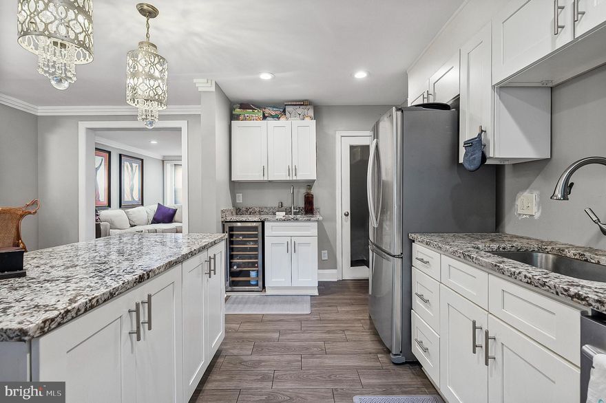 **MOTIVATED SELLER** $5,000 SELLER CONTRIBUTION-BRING ALL OFFERS

Welcome to The Northwood Area-1229 Winston Ave Townhome. This home is a 4-bedroom, 1-full- 1-1/2 bath home. Step into this spacious living room with Beautiful original hardwood floors throughout the first and second levels with recessed lighting. Enjoy entertaining in the mid open concept living room, dining/kitchen area with a walk out to the back yard. The kitchen has plenty of cabinet space with a built-in wine fridge perfect for separate storage from refrigerator. Upstairs you'll find 3 bedrooms with 1 bedroom turned into a custom designed walk-in closet; perfect for an overflow closet. Each room has frosted doors complimenting the design of this home and light fixtures to accent the doors. The Basement is fully finished with a 4th bedroom and an open area with a mini fridge and counter space area. Perfect area for a 4th bedroom or home office. You'll also enjoy a half bath as well as a walk-out to the back yard. This property also has space for a future parking pad for off street parking. This neighborhood is well sought after due to its proximity to schools, shopping, dining, public transportation and places of worship. This home is a MUST SEE and WON'T LAST LONG!!!