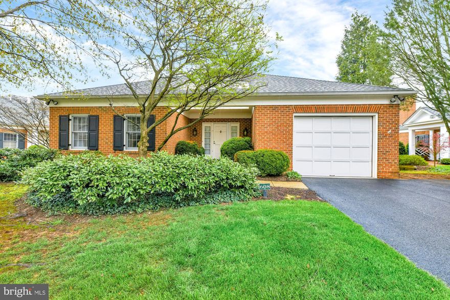 Welcome to 608 Brightwood Club Drive. This stately, detached brick home is designed for those who love space, light, privacy and the beauty of the outdoors!   There is so much exquisite detailing, such as 9' ceilings, a lovely fireplace, crown molding, and beautiful built ins. Once you enter, you will find gleaming hardwood floors, a large, bright kitchen, with garage access, the kind of dining room that holds all your friends and invites you to linger long after the last bite is taken.  Off the dining room is a large deck overlooking the immense patio and  gardens below.  The master bathroom has a huge dressing room area and master bath.  There is another bedroom, currently being used as a den.  To access the lower level, take the stairs or the elevator!  There you will find a grand family room, with flanking french doors leading out to a backyard oasis.  There is another bedroom, full bath, hobby/utility room and storage galore!  Brightwood has just 16 of these detached cottages and this home is truly one of a kind.  What makes it so special is the light throughout, the gardens, and the value.  Priced below the market, this beautiful home is a steal!  Brightwood is truly a special place to live for those 60+.  Every detail of the homes is carefully considered to allow you to live your life with dignity, and safety.  The gated community offers outstanding services and amenities, some of which include:  weekly housekeeping and linen service (they even iron your sheets!), nightly dining, private drivers, private shoppers, fitness instruction, indoor pool, 9 hole golf putting green and more!  But the best thing about Brightwood, is that it is a neighborhood, not a facility.  But, if you need help, it's only a phone call away.  Book a tour today!