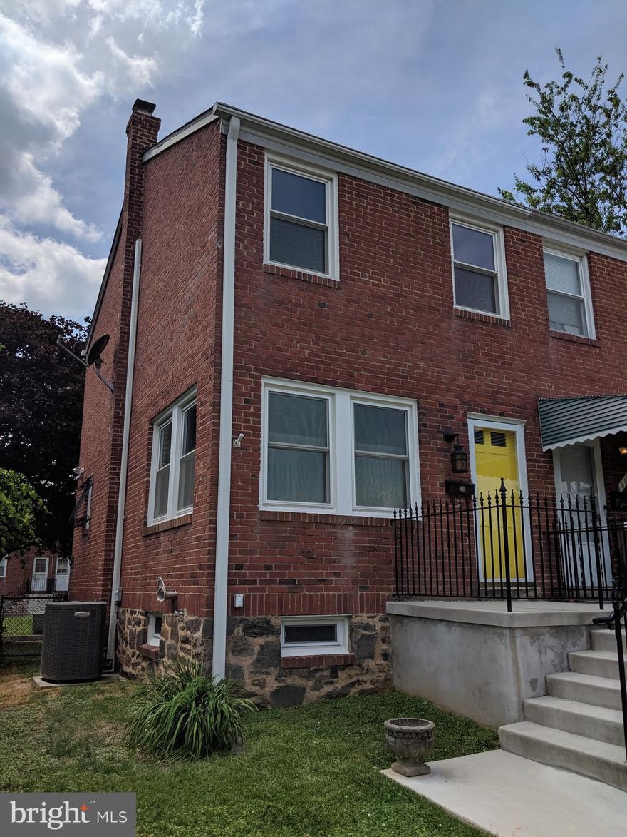 Fantastic opportunity to rehab this solid brick semi-detached home on a quiet and attractive block. Plenty of work has already been done including upgraded electric, central a/c, newer boiler and hot water heater, new sidewalk along with porch and fencing, replacement water line from city to house, replacement windows. Redo the kitchen, bath and some cosmetic work and you'll have a simply terrific home!  Please note the home is being sold as-is.