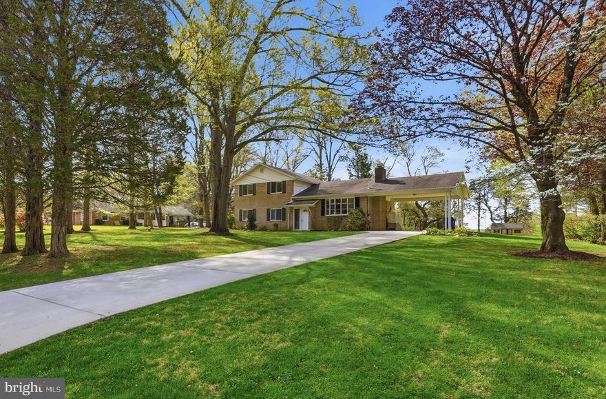 This customized, brick, four-level split, has six bedrooms and 3.5 bathrooms ready to suit your needs.  If you have a large family/ often have out of town guests, or if there is need for office/ craft room(s) this home will accommodate.  Ample room for everyone.  The kitchen is where we gather... there is space for a large table and plenty of counter space to match.  Since there is an opening/ pass through to the living room, no one gets left out of the conversation.  Carpeting in the living room and upstairs bedrooms is hiding a lovely hardwood flooring( Primary bedroom photos show what the flooring looks like)!   Home has a wood burning fireplace in the living room for that cozy warmth, a den, & rec room, plus it has plenty of storage space.  The home is beautifully sited on almost a full flat acre (.95) with mature trees.  The backyard includes a large shed complete with electricity & workbench, plus a greenhouse to get those seedlings started.  So much room for gardens, play, parties, pets, or maybe a future addition.  Great location close to Olney & Silver Spring shopping areas. Easy access to I-200(ICC) which take you straight to I-270 and I-95 for commuting.  Just 3 miles to the Metro's Red-line in Glenmont (avg. 10-minute drive)