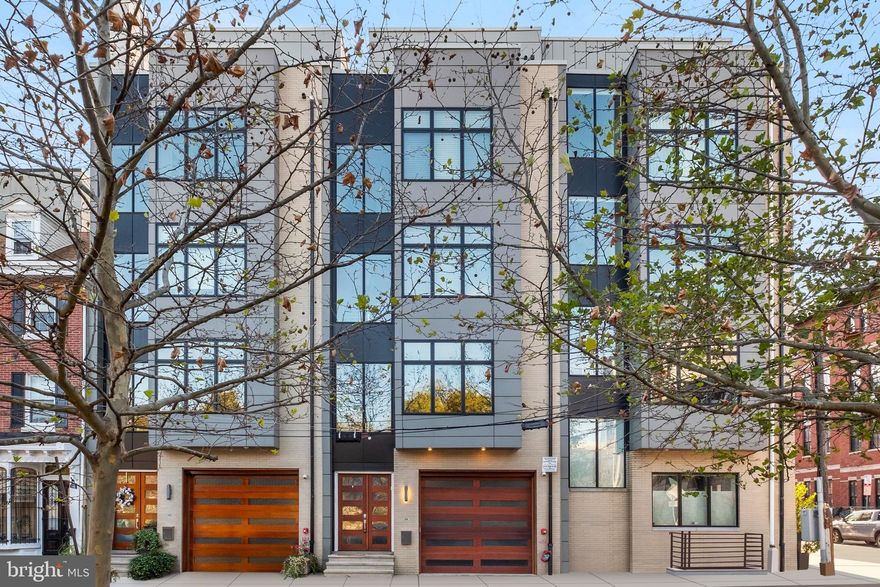 Step into a world of luxury with this exceptional five-bedroom, five-and-a-half-bath home in the vibrant heart of Old City. Featuring two-car parking, an elevator, and four private outdoor spaces, this residence is designed for the ultimate in comfort and convenience. With three years remaining on a real estate tax abatement, this home offers incredible value.
The expansive living and dining spaces are designed for both entertaining and relaxation, with a chef's kitchen outfitted with top-tier Miele appliances, Silestone countertops, Poggen Pohl cabinetry, and a breakfast bar. The open-plan layout leads to a spacious living area with a cozy fireplace, floor-to-ceiling windows, and coffered ceilings. Step outside to your own private deck, the perfect spot for morning coffee or intimate outdoor dining.
The primary suite is a luxurious retreat, featuring a large bedroom, two walk-in closets, and a spa-like bath with heated floors, double sinks, a soaking tub, and a separate shower. Each additional bedroom includes its own custom bath, offering ultimate privacy for family or guests.
On the top level, a den/lounge area leads to an additional private deck with stunning waterfront views. The finished lower level offers a home theater room, a full bath with a steam shower, and an extra bedroom or home gym or a play room. With proximity to renowned restaurants, hospitals, and major transportation routes, this extraordinary home delivers the finest in urban living.