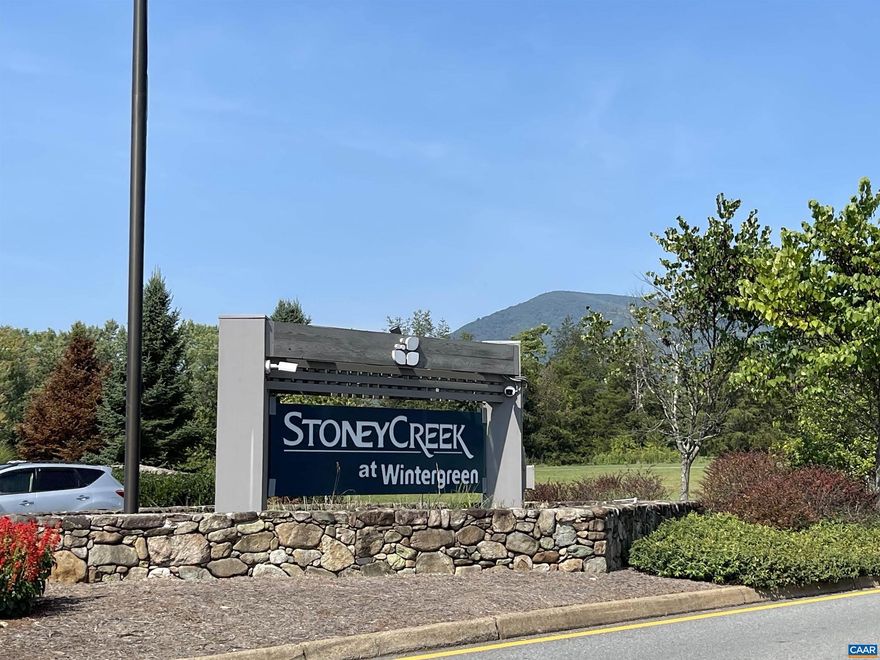 This generously lot at 1.7acres feels larger as it borders a substantial green space to the rear. In the lower foothills, the property is fully wooded. This location is at the end of the road on a cul de sac, so there is only local traffic.