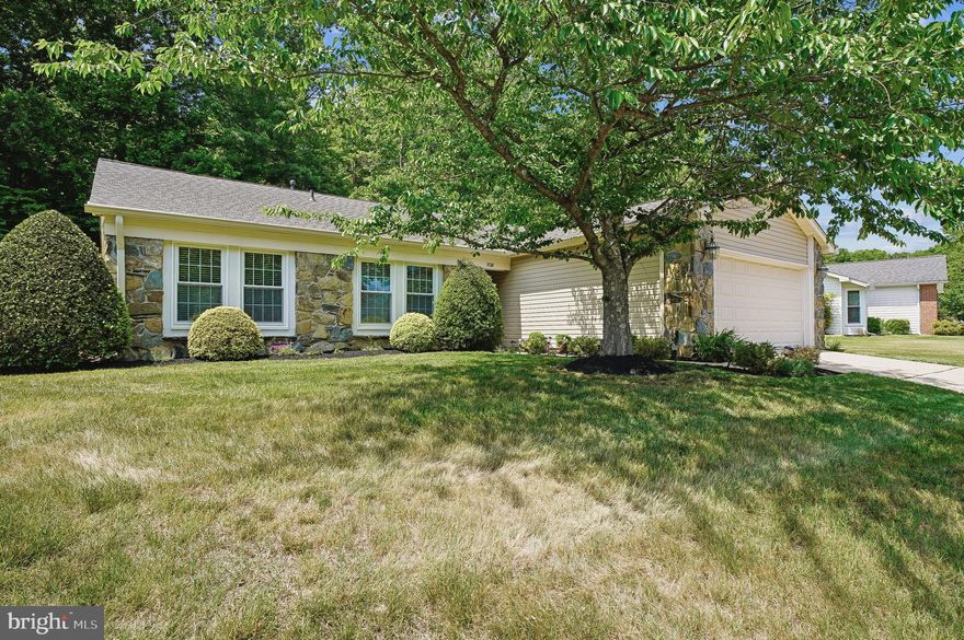 Welcome to 838 Boatswain Way, a beautifully maintained three-bedroom, two-bath ranch-style home with a two-car garage, located in the highly desirable community of Heritage Harbour in Annapolis.
Nestled on a generously sized lot adjacent to community open space, this property offers a peaceful setting with a wonderful sense of privacy and seclusion. Thoughtfully landscaped grounds and a spacious patio create the perfect backdrop for relaxing outdoors or entertaining guests.
Inside, an inviting foyer opens to a spacious living room featuring soaring vaulted ceilings that fill the home with natural light and create an airy, open feel. The formal dining room is ideally situated for both everyday living and special occasions. The updated kitchen is equipped with granite countertops, a gas range, and a layout that overlooks the dining and living areas, making it easy to stay connected while preparing meals.
Just beyond the living room, the bright four-season room provides valuable additional living space and serves as an ideal spot for year-round enjoyment, whether hosting friends or simply taking in views of the beautifully landscaped backyard.
The generously sized primary suite features vaulted ceilings and a private en-suite bath with a walk-in shower. Two additional bedrooms share a well-appointed hall bathroom, offering comfortable accommodations for family or guests.
Residents of Heritage Harbour enjoy an exceptional 55+ lifestyle with an impressive array of amenities, including a clubhouse, indoor and outdoor swimming pools, fitness center, golf course, tennis and pickleball courts, walking trails, library, woodworking shop, boat slips, and a vibrant calendar of clubs, activities, and social events. Conveniently located near downtown Annapolis, shopping, dining, and medical facilities, Heritage Harbour offers the perfect blend of comfort, convenience, and community.
