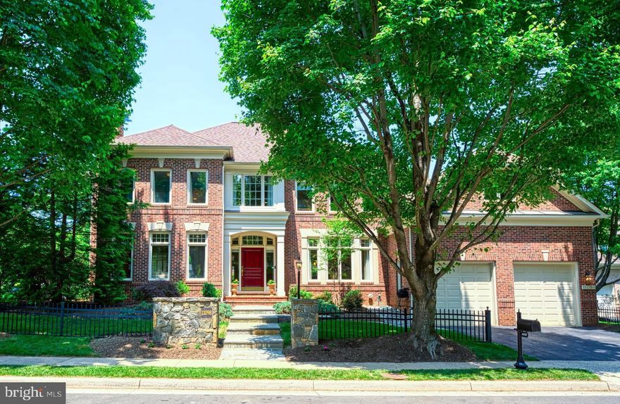 Fabulous All Brick North Reston, Gulick Colonial! Rarely available in One Cameron Place.  Over 7000 sq ft of living space, this home has been meticulously maintained by the original owners.  It was the former model!  This stately home has a private guest suite over the garage.  Quality and elegance show throughout! The solid wood front door open to a grand curved staircase.  There is plenty of natural light that shines through the walls of windows in each room. The elegant dining and living rooms are in front on either side of the foyer. The gourmet kitchen with double island opens to the bumped out breakfast area surrounded by bay windows that is next to the spacious family room with gas fireplace. The family room and breakfast area walk out to the flagstone patio. There is an easy flow that brings the outside in. The backyard has mature professional landscaping that is anchored by the stone monuments and an iron fence.  The main level also features a conservatory/music room that has the 3rd fireplace on this level. Next to that is the private study.  The large mudroom and laundry room off the garage makes it very convenient area to drop off coats & shoes and keep the everyday clutter out of the elegant rooms in the house. Here you will find the back staircase up to the private guest suite. The upper level has 4 excellent size bedrooms. All have private access to a bathroom. The primary suite features two large rooms surrounded by windows, 2 walk in closest and a luxury primary bathroom.  The lower level has plenty of room for any extracurricular activity whether it is exercising, watching a movie in the theater room, gaming in the 2nd family room with  a 4th fireplace or entertaining at the wet bar.  If quiet time is needed, there is a 6th bedroom that is tucked away. There is easy access to the outside from the stone patio that leads up to the backyard. Neighborhood amenities include a Basketball court that is often used as can be used for Pickleball. There is beautiful 55 miles of paved and natural surface pathways winding through Reston. Walk or Bike to the peaceful and lush Lake Fairfax Park which offers a waterpark, carousel, picnic areas, extensive walking/mountain bike trails, skate park, boating and more. North Point’s Giant Grocery store and Restaurants, Harris Teeter and Home Depot are all close by. Or spend your Saturday mornings strolling to the farmers market at Lake Anne to pick up fresh produce for the week or sit outside by the lake at one of the many locally owned restaurants & shops. Enjoy your own piece of private paradise while still having quick access to all the conveniences and amenities of Reston Town Center, concerts at Wolf Trap, shopping at Tysons Corner or Dulles Mall, and Reston /Silver Line Metro Station. You don’t want to miss this beautiful home in the sought-after One Cameron Place neighborhood of North Reston!
OPEN HOUSE: THURSDAY, MAY 25TH FROM 5:00 - 7:00 PM AND SATURDAY, MAY 27TH FROM 1:00 - 3:00 PM & MAY 28TH FROM 2:00-4:00PM!