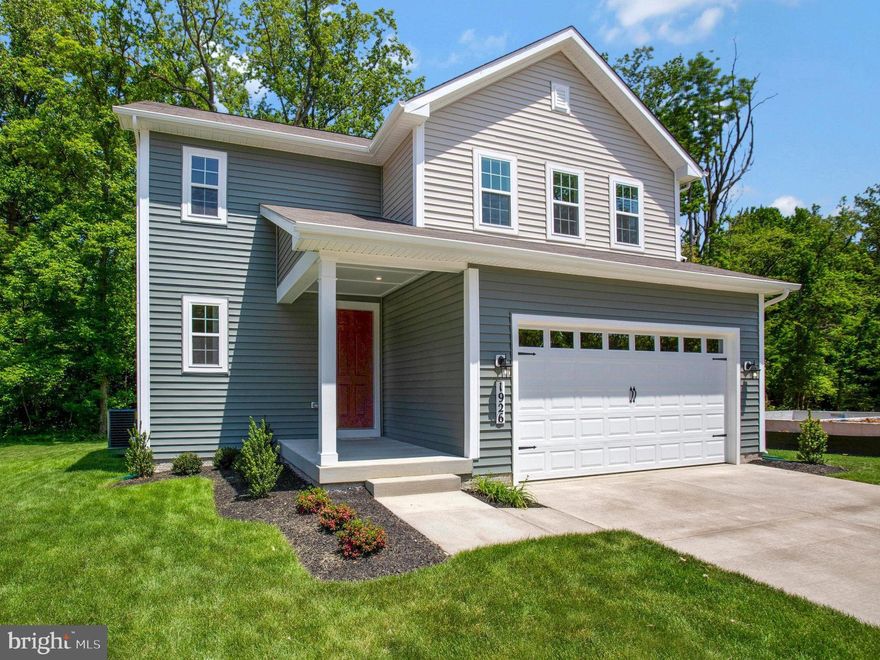 MOVE IN THIS MAY! ASK ABOUT SPECIAL FINANCING! This new construction Coral home on a wooded homesite by Richmond American is almost complete! Included features: a charming porch, a well-appointed kitchen offering quartz countertops, SS appliances, a roomy pantry and a center island, an elegant dining room, an expansive great room boasting an electric fireplace, an airy loft, a lavish primary suite showcasing a private bath with double sinks and a generous walk-in closet, a convenient laundry, an unfinished basement ready for your finishing touches and a 2-car garage. Expansive center meet sliding door, 9ft main floor ceilings with 8ft doors! Turkey Point Park, Middle River, White Marsh and Baltimore Boating Center are located nearby, as are several notable schools. Residents will also appreciate close proximity to shopping, dining, entertainment and outdoor recreation. Sales centers are OPEN but visitors are encouraged to call ahead to be guaranteed a dedicated appointment. Ask about limited time offers!