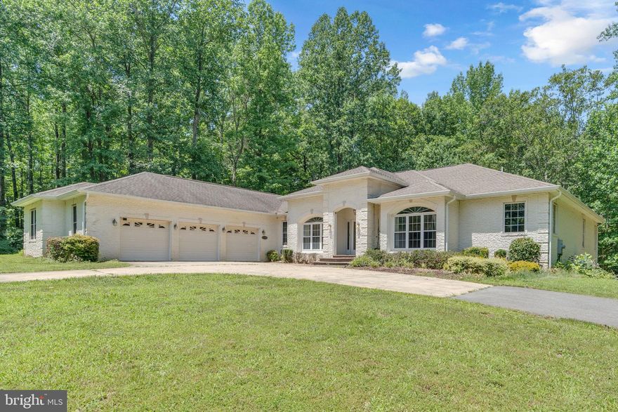 Spacious and private 4-bedroom, 6-bath home available for rent on nearly 5 acres in Brandywine. This custom-built, all-brick rambler offers close to 8,000 sq ft of finished living space with new flooring, and recently serviced well and septic systems. 
The open main level features multiple living areas, a well-designed kitchen, and a large primary suite with a spa-style bath. Each additional bedroom includes its own private bathroom. Enjoy outdoor living on the large deck overlooking wooded views, plus a fully finished walk-out basement with a movie room, bar area, and flexible bonus space.
Additional features include a long private driveway with ample parking, attached garage, EV charging station, and filtered well water system. Conveniently located about 30 minutes from Washington, D.C., and close to shopping, major commuter routes, and nearby parks.