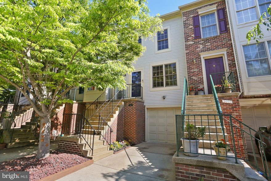 3 level updated townhouse in the Village of Gum Springs! Located conveniently between US RT 1 and George Washington Parkway, with easy access to Fort Belvoir, Huntington Metro, Old Town Alexandria, The Pentagon, Crystal City/National Landing, Washington, DC. Walk a few minutes to shops, restaurants, gym, public library, weekend farmers market, neighborhood tot lot/playground or dog run. Enjoy peace and quiet on this cul-de-sac court and a private outdoor deck space afforded by trees and privacy screens.  Walk into the main level with hardwood floors throughout here and upstairs. The kitchen features granite counters and recently upgraded stainless steel appliances. Upstairs invites you to two sizable bedrooms and 1 full bathroom with an attic pull down stairs featuring a large attic storage space - with the possibility to finish it out for a 4th floor/loft space like other units have. The basement leaves you room for flex space with plush carpet, access to the secluded back yard or sizable 1 car garage. Parking for up to 2-3 cars in your garage, driveway and 1 additional guest spot. This is a great deal for the location.
