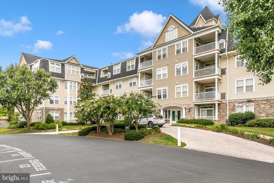 Welcome home to this immaculate first floor condo in the heart of Wormans Mill.  This beautifully updated home is move in ready and waiting for you!!   This home features 9' ceilings thru-out, a fully renovated kitchen with stainless appliances, granite counters and tile backsplash, open dining and living room with fireplace and sliding glass door leading to your private patio.   The spacious primary suite offers a walk in closet with organizers, closet with washer/dryer and private full bath.    Extra storage is found in the outbuilding and a parking space in the underground garage is deeded with the sale.   Enjoy all the conveniences of the community to include: 2 restaurants (Plaza Mexico & Ricci's), shopping and great access to all commuter routes.