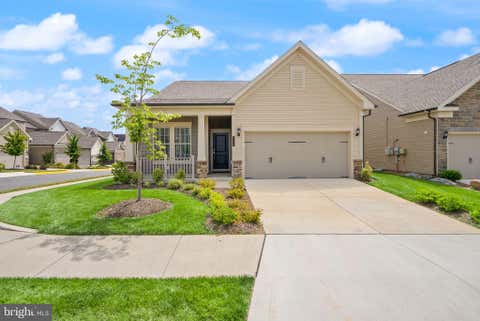 Photo of 6765 Azalea Garden Lane, HAYMARKET, VA 20169 (MLS # VAPW2126420)