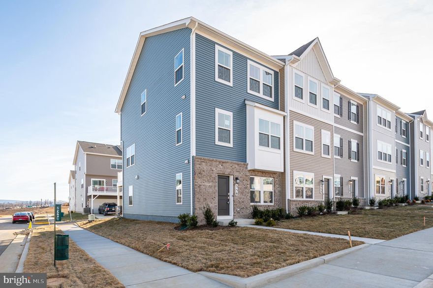 FOR RENT! Located in the premier community of Shenandoah Springs in Ranson, WV, this BRAND NEW END UNIT townhome offers 3 levels of finished living space and 3 BR/ 2 full & 2 half BA with rear 2 car garage. Laminate LVP flooring throughout the main level. Upgraded kitchen with eat-in dining, oversized island, granite countertops, upgraded cabinets, pantry, and stainless steel appliances. Large deck off kitchen that overlooks the future community pool. The primary bedroom features a walk-in closet and a private ensuite bath. Two additional bedrooms, a full hall bath, and laundry on the bedroom level. The lower level includes a half bath and den space, ideal for additional living space or office. Excellent commuter location with easy access to 340 and Route 9. Close to shopping and restaurants. Washer and dryer included. Applicant(s) must be able to pass credit/background check. Pets are case by case with additional pet deposit and rent. No Smoking. Security deposit and first-month rent due upon lease execution. Call to schedule your tour!
