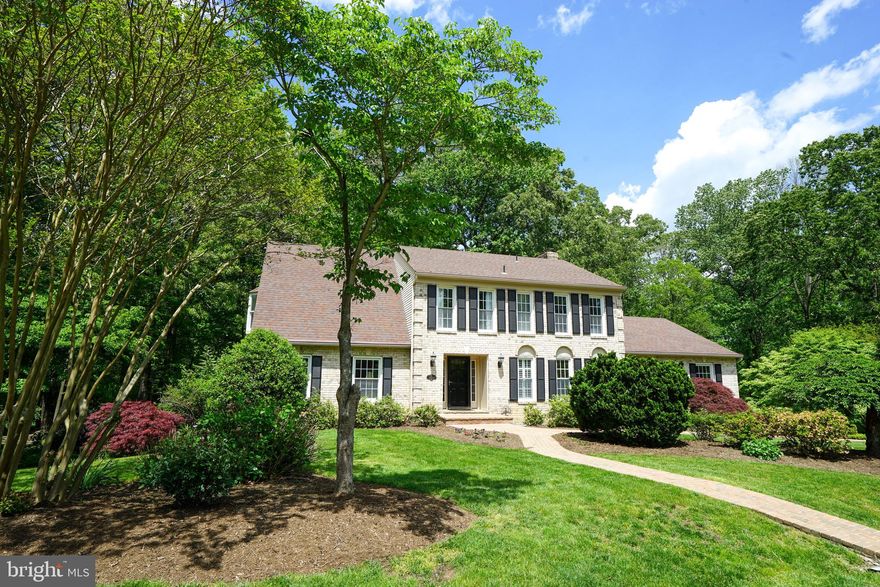 Beautifully updated colonial centrally located in the heart of Fairfax County.  Convenient to everything!  Just minutes from Fair Oaks Mall, Reston Town Center, Wiehle-Reston Metro, Tysons, the Washington and Old Dominion Trail, and Dulles International.    Three levels, 4 bedrooms, 2 full baths and 2 half baths.  Spacious rooms with open and airy floor plan.  Several nice updates that include: built-ins, office and great room, new carpet, new flooring, renovated bathrooms and recently updated kitchen.  Large Recreation room downstairs with spare room, half-bath, a large storage room, and walkout. Side load two-car garage with with extra wide driveway.  Large deck on the main floor overlooking exceptionally landscaped yard and natural common area.  All situated on one of the most scenic lots in Northern Virginia. This one is a must see!
