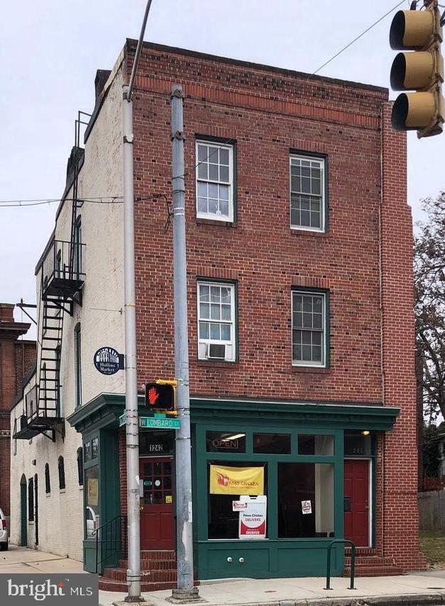 This building is a great buy with excellent return for your money. Building renovated in 2010. This property would be excellent for owner occupant. You can get an SBA loan with 10% down as owner occupant. First floor restaurant and carry out, seating for 32 people, full commercial kitchen, two half bathrooms, and basement for storage. Everything in the restaurant conveys AS-IS, and new owner will need to acquire new tenant for restaurant space. Restaurant could be rented for $3000 per month. Second floor with 2BD/1BA unit could be rented rented for $1200 per month. Second floor also has office/efficiency with full bathroom rented for $600 per month. Third floor with 2BD/2BA unit rented for $1030 per month. All units individually metered for electric. Tenants pay for their own utilities except water. Both apartments have hard wood floors, range/oven, built in microwave, dishwasher, refrigerator with ice maker. Corner building with great exposure, and plenty of parking. Bus stop in front of building. Owners are Agents in state of Maryland. Building sold As-Is. Showings on Sundays only.