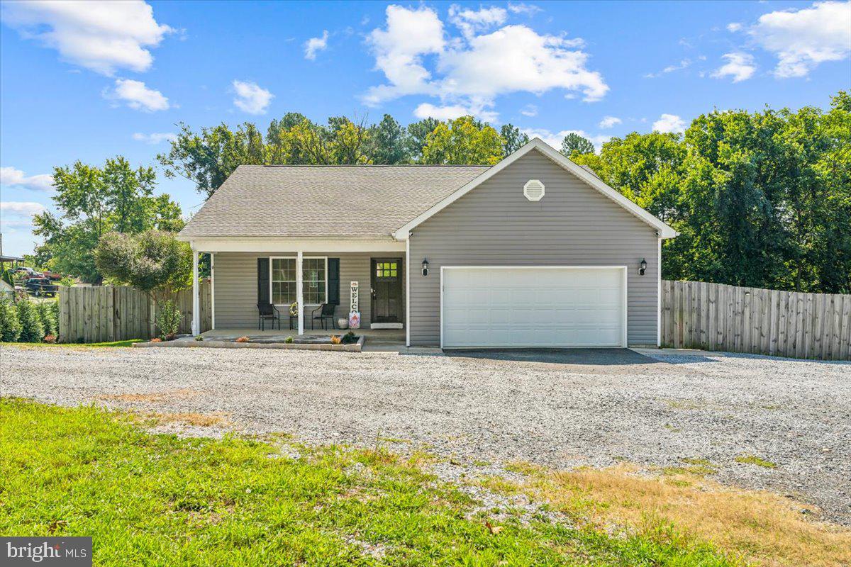 Welcome to this newer and beautiful rancher on just over 2 acres! Built in 2019, this 3 Bedroom/2 Full Bath Home features a spacious living room, eat-in kitchen, large "galley" kitchen with white cabinets, quartz counters, stainless appliances and LVP flooring throughout. Outdoors, a large deck with patios beneath, offers plenty of entertaining space and basement access, as well. A large fenced yard is perfect for little ones or pets, with plenty of room to enjoy. Heading to the bedrooms, the Primary Suite is first, featuring a spacious bedroom with large walk-in closet, a bath with dual vanities, a newly upgraded tile shower with custom glass, and updated lighting. Exiting the Primary, directly across the hall is a large laundry nook, making it easy to access and steps from any of the bedrooms. Further down the hall, a shared bath with large vanity, updating lighting and a shower/tub combo, complete the space for any living situation. Two large bedrooms complete the property for living or office space, which ever you prefer. The lower level is spacious and features a walk out to the back yard. Framing is complete and some drywall has been finished. The lower level offers space for a bathroom rough-in, closet, additional bedroom with egress, as well as a living area and storage - it's ready for your finishes. This home also features a full sprinkler system, water treatment system with UV, softener and pre-filter to give you peace of mind. The home and yard sit on just under one acre of this large property, with additional acreage in Forest Conservation - meaning, no worry about someone building behind you! Within a few minutes from Downtown Williamsport, Hagerstown, and all major commuter routes. Schedule your showing today!