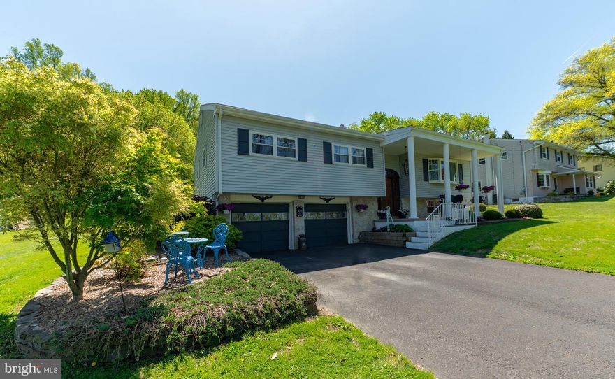 Welcome to a home that truly sets the standard for meticulous care and pride of ownership. This beautifully maintained bi‑level sits on a full, open acre in New Hanover Township within the sought‑after Boyertown School District—an unbeatable combination of space, setting, and convenience.
The main level features stranded bamboo flooring and an open, easy‑flow floor plan that today’s buyers love. The spacious living and dining rooms create a warm gathering space for everyday living or entertaining. The kitchen offers luxurious granite countertops, excellent workspace, and newer stainless steel appliances, including a built‑in microwave, dishwasher, and smooth‑top electric stove.
Down the hall, a full bath with a tub/shower combo serves the two comfortable secondary bedrooms. The primary ensuite is a bright retreat with a skylight, a beautifully tiled shower, and a generous closet.
Just off the dining area is a versatile bonus room—ideal as a guest suite, in‑law space, or private office—complete with its own full bath, large closet, and custom hardwood floors. Sunlight pours into this room, making it one of the most inviting spaces in the home.   The lower level has been finished with "fun" in mind....a corner bar for entertaining, and a coal stove to warm you on those cold winter nights, complemented with easy-care laminate flooring!    The laundry room is part of a utility area and a convenient pantry!    The two-car garage is currently being used as a craft area,  but it offers two garage door openers.  This property has been exceptionally updated and maintained, including the Roof replaced in   2014, Bathrooms renovated in 2018, Stranded Bamboo flooring installed throughout the main level, Windows, doors, and vinyl siding replaced, Central air installed in 2019, Full HVAC service completed in 2025, and upgraded 200‑amp electrical service....And to top it off, the seller is including a 1‑year AHS home warranty for added peace of mind.   This home is a true standout—beautifully cared for, thoughtfully updated, and ready for its next owner to enjoy.