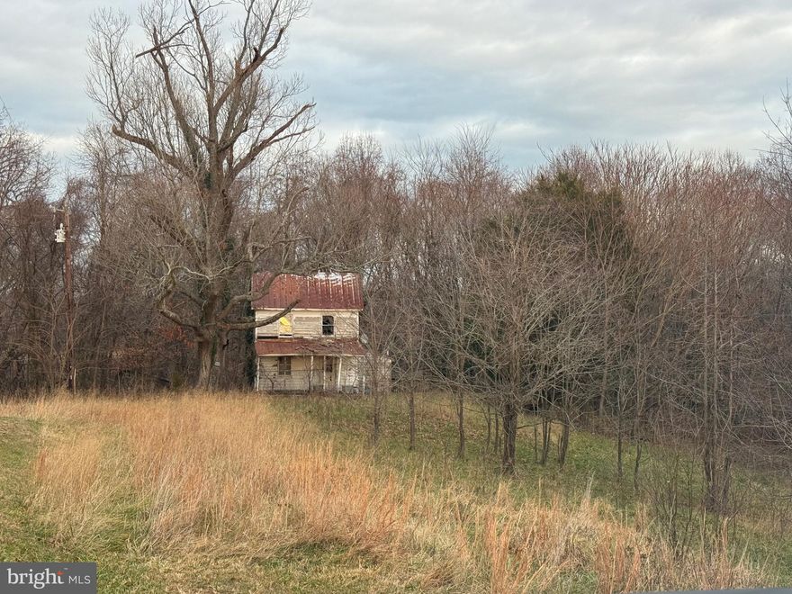 Almost 1.5 acres surrounded by farmland in mid Calvert location.  Bring your vision and bring this old farmhouse back to life.  Home is being sold as is.  Call for more details.