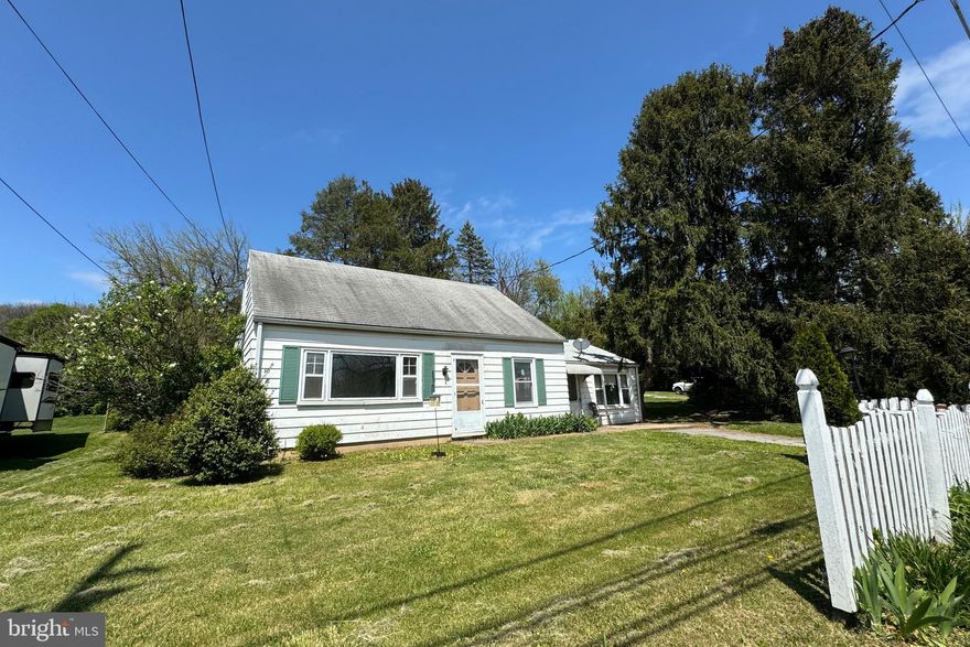 Leesport single with endless possibilities. Located just down the street from 183 for an easy commute to just about anywher this cute home sits on two lots  providing plenty of parking and outdoor space to enjoy during the spring and summer months. located in the Schuylkill Valley School district this house would make a great place to call home.  Walking in you will see the garage was previously converted into living space, two bedrooms to be exact but the center wall has since been removed  opening it up into one big room. You will also find the full bathroom and  one of the bedrooms on the main  floor perfect for those who like to avoid stairs. On the second floor you will find two nice sized bedrooms with original wood floors.  walking around back you have a covert porch  along with a shed and dog pen area toward the rear of the lot.  With a little elbow grease this property can be transformed into its former glory. Call to schedule your showing today before its too late.