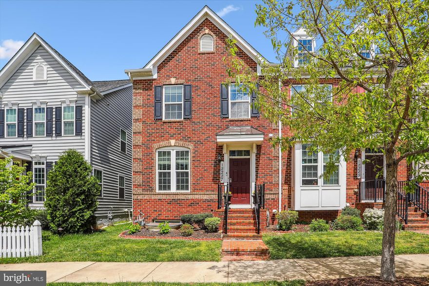 Meticulously maintained - Welcome home to this Charming, 4 bedroom, 3 Full Bath, 1 Half Bath Townhouse located in Clarksburg Village. This gorgeous home offers an open floor-plan with over 2500 sqft of living space. In it you will find beautiful hardwood floors, a spacious living room, an oversized eat-in kitchen with tons of counter space, a large granite center island that walks directly out to a huge patio . The upper level features 3 spacious bedrooms, 2 full baths, and laundry. The Primary Suite has a large walk-in closet plus an ensuite bath with double sinks and a separate bath and shower. The lower level also offers great space which includes a  bedroom, and a full bath. 2 car, detached garage with driveway for extra parking. To top it off, this home is ideally located, within an amenity rich community that offers walking trails, tot-lots, 2 community pools and is within walking distance to shops and restaurants. Plus it's a moment drive to I270 and the Prime Outlet Mall. With all this home has to offer, this is one you won't want to miss!