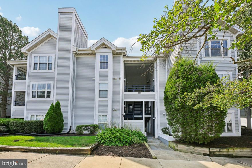 Convenient, Comfortable, and Full of Charm! Welcome to 608 Rolling Hill Walk #201 — a beautifully remodeled 2-bedroom, 2-bathroom condo ideally located in the heart of Odenton. This spacious home features a large primary suite complete with a private balcony, perfect for enjoying your morning coffee or winding down in the evening. The open living area boasts a cozy wood-burning fireplace, while the private patio backs to serene woods, offering peace and privacy.

The condo has been thoughtfully updated with granite countertops, and the HVAC system is less than 2 years old. A newer water heater (under 5 years old) adds even more value and efficiency. With a commuter-friendly location just minutes from major routes, the MARC train, Fort Meade, shopping, and dining, this home offers both comfort and convenience. Whether you're a first-time buyer or looking to downsize, this move-in ready condo is a must-see!