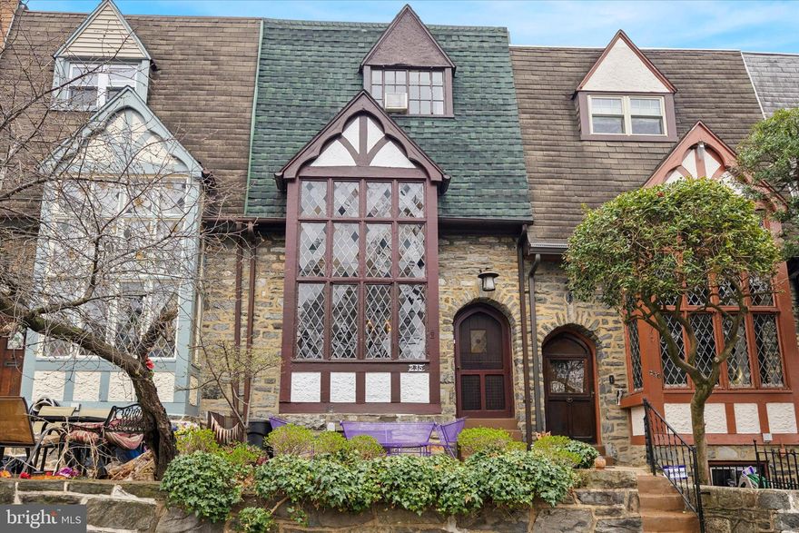 The one you have been waiting for! This charming English Tudor sits on one of Upper Darby’s most picturesque, tree-lined streets. Step inside to an inviting open-concept first floor, where soaring 14-foot vaulted ceilings and exposed wooden beams create a warm, timeless ambiance. The spacious living room is filled with natural light from a tall bay window featuring stunning stained glass, complemented by hardwood floors. A seating nook beneath the staircase, centered around a charming fireplace, offers the perfect spot to relax. Just beyond, the large dining room is ideal for family gatherings, while the kitchen at the rear of the home leads to a lovely deck—perfect for grilling. Upstairs, the primary bedroom features hardwood floors and generous closet space, with a convenient Jack-and-Jill bathroom complete with a tub/shower combo. The third floor offers two additional spacious bedrooms, each with ample closet space, along with a half bath. The finished basement complete with washer/dryer, provides extra living space, a half bath, and access to the garage, where you’ll find the washer and dryer. Don’t miss this opportunity—schedule your showing today!