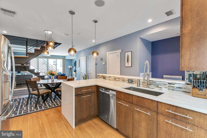 Spectacular, light-filled 19 ft. wide townhome in the vibrant Graduate Hospital neighborhood with TWO CAR GATED PARKING. Awarded for its energy efficiency, this 2,700 square foot Carpenter Square contemporary townhome offers 3 Bedrooms, 3 Full Baths and a Powder room. Enjoy luxurious living with two terraces, a green roof, ROOF DECK and beautiful designer finishes throughout. The main level features a spacious and open layout with a European Kitchen, Dining Room, Powder Room, coat closet, large pantry, a vacuum/stroller closet and a gracious Living room with an expansive wall of glass leading out to an outdoor terrace to relax or dine under the stars. The Kitchen features bar seating, Stainless Steel appliances, custom wood cabinetry, Quartz countertops, and a luminescent glass backsplash. The Dining area provides the ideal space to share meals with friends and family. The open steel and wood staircase leads up to the second level which features two large Bedrooms that share a hall Bath along with a laundry room with custom cabinetry, front loading Washer & Dryer, utility sink, floor drain and quartz countertops. The entire third floor is a stunning Master Suite which boasts a wet bar with a beverage center and microwave, a huge walk in closet which has been fully customized, a second full closet, and a Spa like Bath with a double vanity, a glass enclosed shower, a private toilet room and an intimate terrace with a set of spiral stairs that lead up to a green roof and roof deck with the most amazing skyline views! The homes lower level offers a second coat closet, access to the 2-car carport, rear drive aisle, and a finished lower level, ideal as an office, gym or fourth guest room with its own full Bathroom and ample closet space. Other features in the home include a whole home audio system, 2 Zoned HVAC, whole house water filtration system, remote controlled skylight, a gas line for a fireplace in the Living room and a tankless hot water heater. Walk to local restaurants, L'anima and Chicks plus neighborhood amenities like the YMCA and Lincoln Square at Broad and Washington, complete with a Sprouts Farmers Market, Petsmart, Target, Starbucks and a Wine and Liquor Store. Discover Carpenter Green, a public, dog friendly park at the corner of 17th & Carpenter St. Easy public transportation to get in and around town. This home has been meticulously cared for!