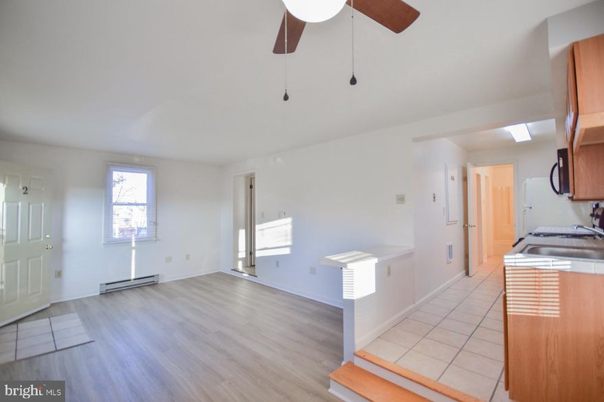 Rent includes electric up to $100/month, water, sewer, trash and use of laundry facilities. Beautiful 2 bedroom apartment located walking distance to shopping and dining. This cute and perfect little place is in like new condition. Not a spec of dust makes this building perfect for the discerning renter. On street parking with one additional parking space provided for free in the private parking lot. Quiet and secure, the neighborhood is safe and progressing. We think you'll love it! Entrance in back of building.