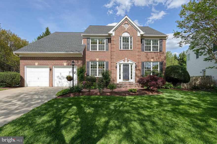 Welcome to 17823 Falconcrest Circle. This  CARUSO built, Harvard Model stunning brick-front colonial home nestled in the heart of Kingsview Village, Germantown. offers versatile living spaces, modern updates, and a convenient location. With 4 bedrooms and 3.5 bathrooms, the main level features an updated kitchen with a center island with quartz countertops, sliding doors open from the kitchen to a spacious newer deck, perfect for outdoor entertaining. Large first floor office. The two-story family room with abundant natural light and privacy, features a gas fireplace, perfect for gatherings. Upstairs, the owner suite awaits with large sitting area,  walk-in closets, and a luxurious ensuite bath. finished walkout level basement, accessible through both a separate exterior entrance and connecting stairs, serves as a private haven designed for relaxation and entertainment.  Located in the amenity-rich community, residents enjoy a low HOA fee, pool, tennis courts, a community center, and tot lots. Nearby attractions include the MARC station, Spark Matsunaga Elementary, Germantown Town Center, Maryland SoccerPlex & Indoor Swim Center, and Seneca Creek State Park. Don't miss the opportunity to make this exceptional property yours!