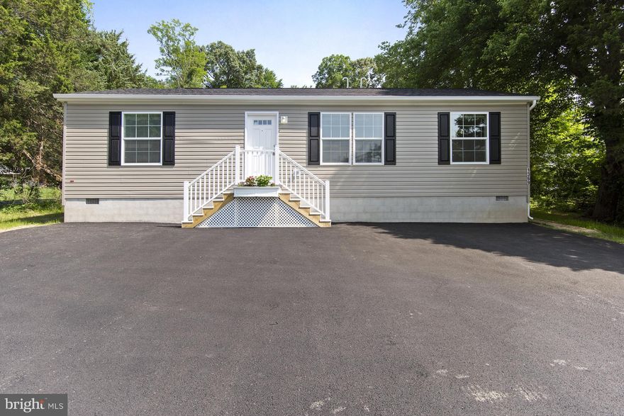 Brand-New 3 Bedroom, 2 Bath Rancher – Stylish, Efficient & Move-In Ready!Welcome to this beautifully crafted brand-new modular home offering 3 bedrooms, 2 full bathrooms, and 1,138 square feet of thoughtfully designed living space, all situated on a .43-acre lot. Every detail has been completed for you, including a new well and septic system, making this home truly move-in ready. Step inside to a light-filled interior featuring Luxury Vinyl throughout and an inviting open floor plan that seamlessly connects the living room, kitchen, and dining area—perfect for entertaining or everyday living. The stylish kitchen is equipped with stainless appliances that include a gas stove, built-in microwave, side-by-side refrigerator with ice maker, and a modern farmhouse-style sink, combining convenience and charm. The spacious Primary Bedroom includes a private en-suite with an oversized walk-in shower, while the second full bath features a tub/shower combo—ideal for guests or family. Outside, a new blacktop driveway and the generous 43-acre lot provide curb appeal and usable outdoor space without overwhelming maintenance. Schedule your showing today!  
 
Whether you're a first-time buyer, downsizing, or simply looking for a fresh, low-maintenance new build, this home checks every box for comfort, quality, and modern living. 
 
Schedule your private tour today—this turnkey gem won’t last long!