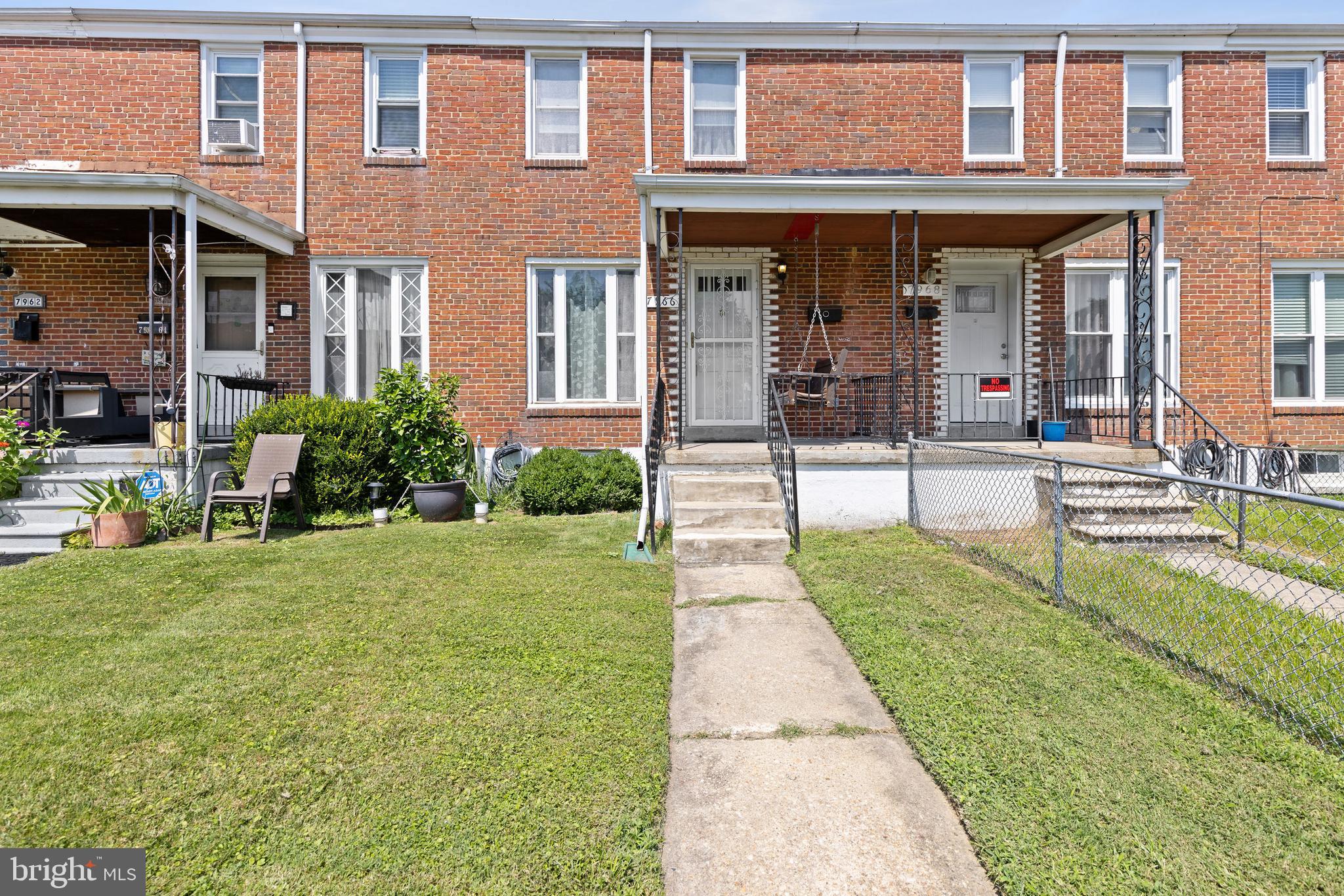 Located in North Point Village, this charming 3-bedroom, 1.5-bath brick townhome offers three finished levels of living space. Hardwood floors add warmth throughout the main and upper levels, while the partially finished lower level includes a convenient half bath, rear entrance, and waterproofing system. Enjoy the fully fenced backyard with a deck—perfect for outdoor relaxation—with the potential to convert part of the yard into a parking pad. Situated in an established neighborhood with on-street parking, this home blends comfort, function, and opportunity.