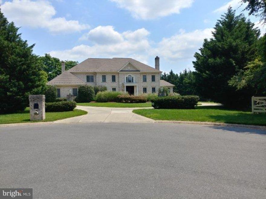 Halloween Treat!! Price slashed over $700K . Stately custom colonial with the features & amenities you could want or expect. Elegant room sizes throughout. Spacious MBR suite w/2 separate MBAs. Slate patio leads to custom pool w/spa; pool house with FBA/changing room along with relaxing area w/fpl and entertainment center.  A magnificent marble floored entry foyer. Custom built-ins throughout.