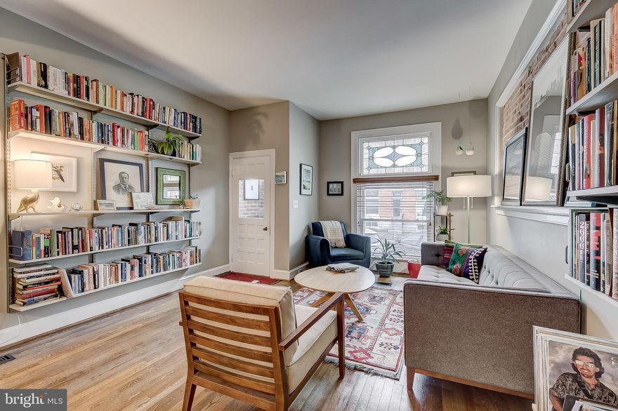 Beautiful renovated Canton home in outstanding location with PRIVATE PARKING PAD! This home has a wide open 1st floor layout with separate living and dining rooms, wood floors, an open kitchen with stainless appliances, granite counters, tons of cabinet space and a walk out to the rear parking pad. The 2nd floor has 2 bedrooms, 2 full bathrooms and a deck off the rear bedroom.  The finished lower level is perfect for additional living space/home office and storage.