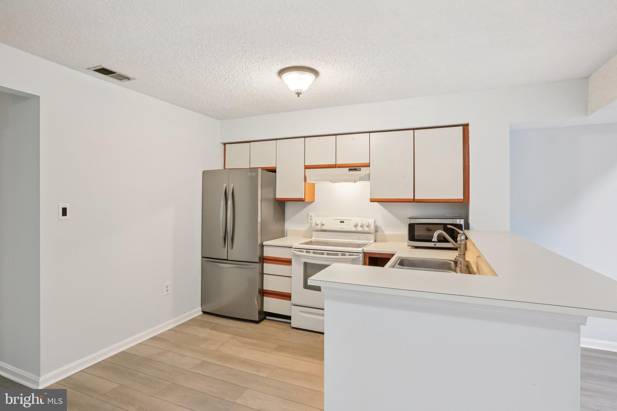 THE TIERS OF LAUREL LAKE - Residential