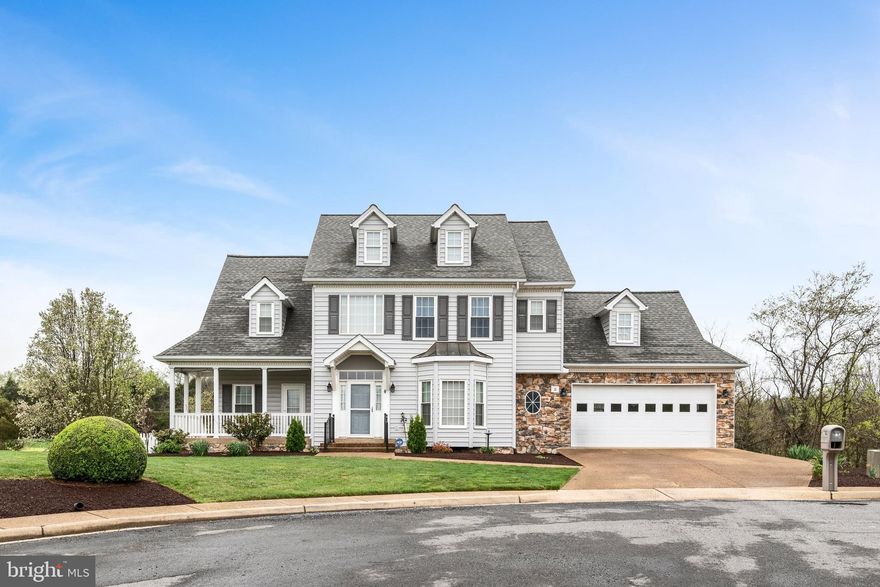 Tucked away at the end of a quiet cul-de-sac in one of New Market’s most desirable neighborhoods, this immaculate, well-maintained home offers peace, privacy, and picturesque views. Take in stunning mountain vistas from the covered front porch—accessible directly from the main-level primary suite—or enjoy the serene golf course backdrop from the private rear deck. The spacious yard features both open lawn and a smaller fenced-in section, perfect for pets, play, or gardening. A covered area beneath the deck provides convenient storage for yard equipment, tools, or outdoor gear. Inside, the open floor plan and soaring two-story great room with a cozy fireplace create a warm, inviting atmosphere. The main-level primary suite features a large en-suite bath with dual vanities and a whirlpool tub. Upstairs, one of the three bedrooms includes a private en-suite bath—ideal for guests—while the other two bedrooms share a convenient Jack-and-Jill bathroom. The space continues into the mostly finished, walk-out lower level offering even more flexibility with a second fireplace and family/rec room, fifth and sixth bedrooms, a full bath, workspace, and ample storage. Major updates—including a new roof, HVAC system, and white vinyl fence—were completed in 2022, providing peace of mind and lasting value. This exceptional home combines beautiful views, thoughtful design, and a sought-after location. Schedule your private showing today!