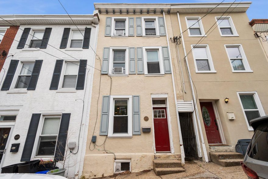 "At HOME" is how you will feel the moment you step into this expansive three-story, four-bedroom row home nestled in the heart of Philadelphia’s sought-after East Falls neighborhood. This residence offers a rare opportunity to build immediate equity; it is a canvas awaiting your personal touch. Perfect for the buyer looking to refresh the space with new paint, refinished flooring, and creative vision to make it shine. As you enter, you are immediately greeted by high ceilings and the parquet wood floors. The first floor layout flows naturally from the living room into a sizable dining room, which serves as the heart of the home and features a stylish-turned staircase. A passthrough cutout provides a visual bridge to the updated kitchen, creating a seamless environment for hosting friends and family.

The kitchen features ample cabinetry, gas range, refrigerator, ceramic tile flooring and backsplash and a wonderful bay window with spacious countertop just waiting for you to grow amazing herbs to add to your culinary masterpieces. Located just off the kitchen is your outdoor oasis. Step outside onto the patio which is a perfect place to grill some delicious meals and entertain your guests. Whether you are a gardener looking to have your own vegetables, plant beautiful annuals or simply prefer to relax in the wonderful garden, this backyard offers endless opportunities for tranquility and recreation.

The upper levels provide a flexible layout tailored for modern needs. On the second floor, you will find a large front bedroom with double windows that let in lots of natural light and ample closet space, a rear bedroom and an upgraded three-piece hall bath. The third floor completes the home with two additional sizeable bedrooms. Additional features include a mini-split in the dining room, windows replaced in 2007, water heater replaced in 2018 and a basement offering space for storage, mechanicals and laundry.

The East Falls community itself is a unique gem nestled along the banks of the Schuylkill River, offering a perfect urban-suburban lifestyle. It is centrally located for an easy commute to both Center City and the suburbs, with major roadways and the regional rail line just a few blocks away. The neighborhood is surrounded by lush parks and trails, including the famous Kelly Drive recreational loop and the six acres of open space at McMichael Park. Residents can enjoy a stroll to the Falls of Schuylkill Library to admire its Collegiate Gothic architecture or explore the nine acres of recreational space at the McDevitt Center. You are also just steps away from a vibrant collection of favorite local restaurants and coffee shops. Come see for yourself why this home, with its incredible potential and unbeatable location, is the perfect place to plant your roots.