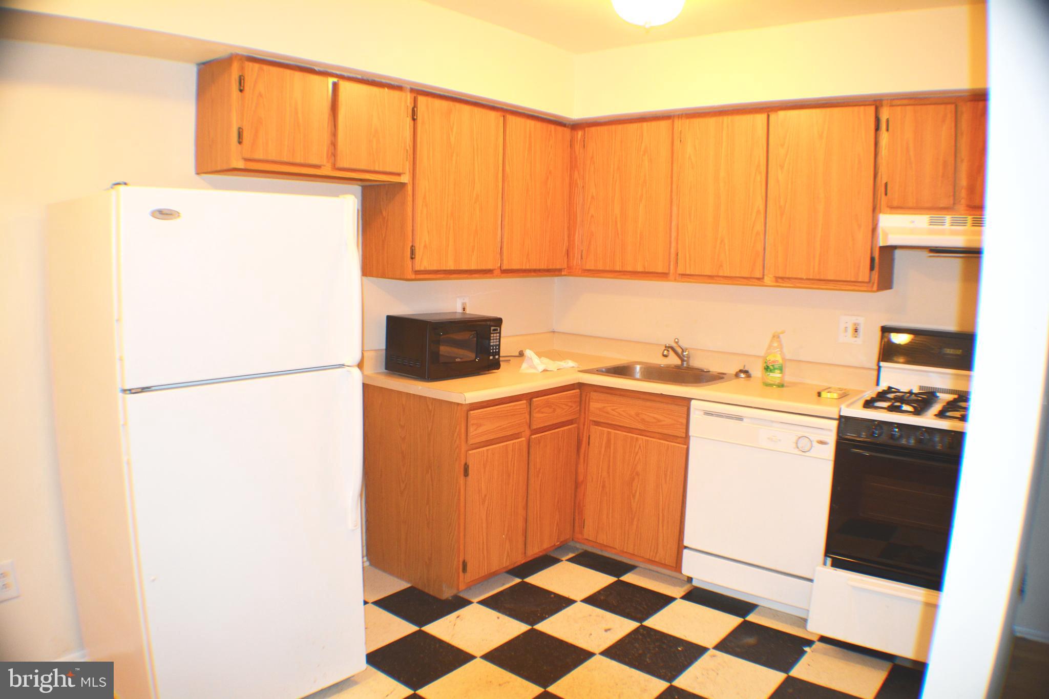 East Falls 1 bedroom apartment with central air, dishwasher and hardwood floors available for early Sept move in. Spacious, open-concept living room/dining room/kitchen. Unit is located on the ground floor. Large bedroom with oversized closet. Personal storage locker in basement for each unit. Laundry in the building. Assigned space off street parking! Less than one block from East Falls train station - simple commute to Center City. Convenient to Jefferson/Philadelphia University, Kelly Drive, Drexel College of Medicine, City Ave and Main Street Manayunk. Cat friendly building - no pet deposit or fee. Heat, gas, water/sewer fee included in rent. Tenant only pays electric. Reach out for applications and showings. Good credit required. Photos are from similar unit - finishes may vary slightly.