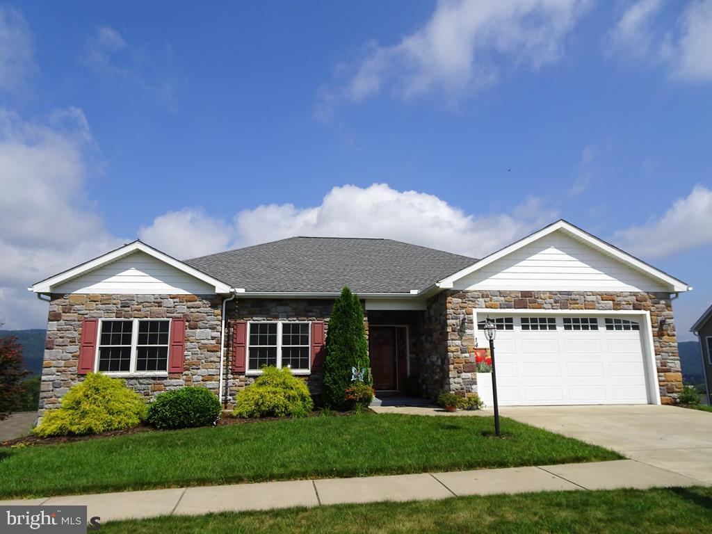 Conveniently located within minutes from PSU, shopping, downtown State College and Bellefonte, this wonderful property features hardwood and ceramic flooring, vaulted and tray ceilings as well as a light and bright eat in kitchen with granite countertops and stainless steel appliances. Enjoy entertaining on the expansive 2 tier deck while overlooking some of the most spectacular mountain views that Centre County has to offer or relax by the fireplace in the spacious great room. This magnificent property also features a naturally lit walkout lower level with family room, full bath and bedroom.
