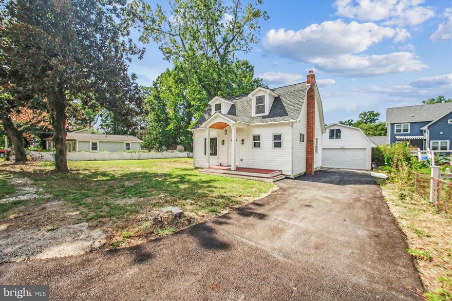 Sought After Woodland Beach!! 
Remodeled Home with 2 car garage with upper level future office.  All remodeling loose ends have been completed. Main Level Bedroom for potential single level living. This single family home offers finished 1600+ sq footage – 3 bedroom 2 bath with 3 levels of living space within walking distance to private community amenities and waterfront.NO HOA , yet ability to access private community beaches, fishing pier and community docks, playgrounds as well as several local marinas & London Town community center to enjoy waterfront lifestyle community. All the finishes are brand new, it's a must see.
Located in the heart of Woodland Beach, this community offers 5 beaches, community docks, a marina, multiple boat ramps, playgrounds, and green spaces. Come live the Woodland Beach lifestyle and be on vacation all year round! Canoe, Kayaks & storage, Boats, Navigable water, Private & Public beach access, swimming allowed, fishing allowed, water access off of Glebe Creek to South River.
Through generic conversations with the county, health department and well drilling contractor, the left side of this property could be used to develop another property in the future. Client can live, enjoy and love their remodeled home while planning for another home next door.