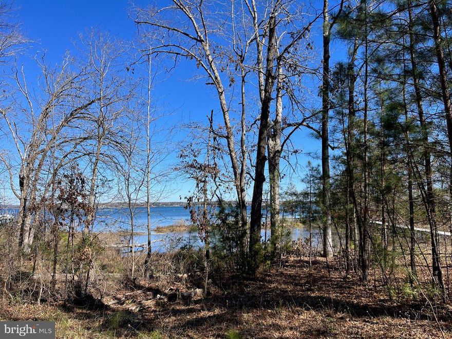 This gorgeous lot is protected and tucked away with just a short boat ride to the Rappahannock River & the Chesapeake Bay. This residential lot is located in a rural community in Lancaster county. Large acreage with 171 feet of water frontage. The septic is already installed and ready for you to build! Yankee Point Marina is close by with a restaurant, poolside cafe, sailboat boatyard, fuel & marina. The neighborhood consists of site built homes with private wells and private septic systems.