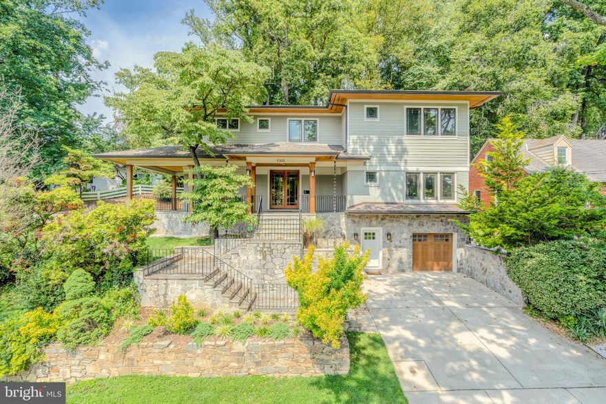 This stunning six-bedroom home is truly a showstopper! Completely renovated and expanded in 2018 by local architect Nick Lucarelli and Hartland Development, this home is located in Springfield, one of the most coveted neighborhoods in Bethesda. The front porch invites you into the spacious foyer. The first floor features a gorgeous kitchen complete with stainless steel appliances, gracious formal dining room, sunlit family room with fireplace, an office/bedroom, full hall bath and additional en-suite bedroom. Upstairs boasts a luxurious primary suite with walk-in closet and spa-like bathroom, three additional bedrooms and two full bathrooms. The lower level includes a sizeable recreation room with wet bar, full bathroom, ample storage and mudroom off of the garage. Outside enjoy a fenced in side yard and rear patio with built-in grill, perfect for outdoor entertainment! The close-knit community is within close proximately to the newly developed Westbard Sqaure, as well as Whole Foods Market, and short distance to Millie’s, Pizza Paradiso and Compass Coffee.  Enjoy hiking and biking along the nearby Capital Crescent Trail and Wood Acres Park.  The home also provides easy access to the area’s major roadways and airports.