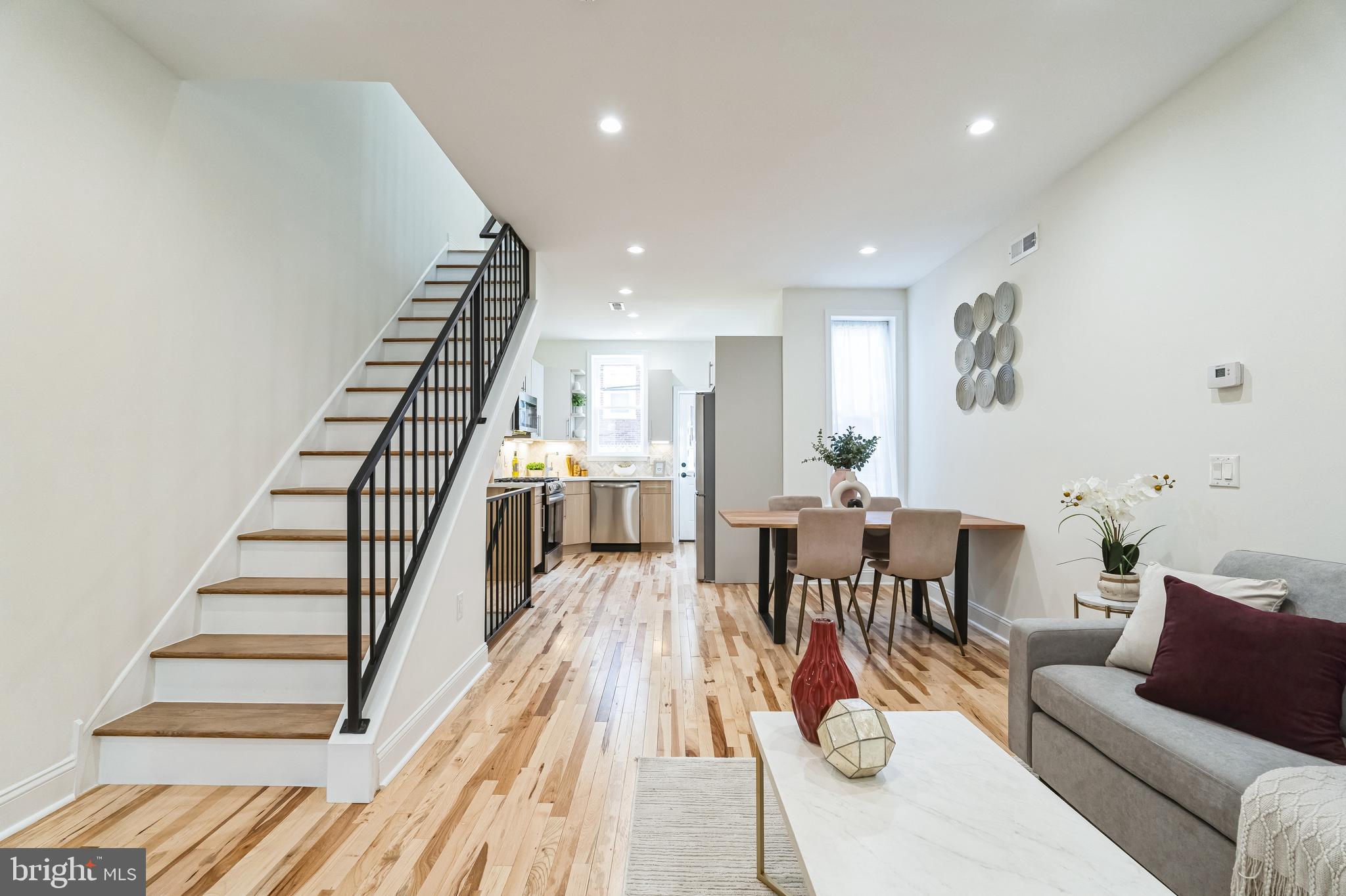 Modern Elegance Meets Classic Charm
Welcome to 921 S. Conestoga St., Philadelphia, where contemporary design and timeless sophistication come together in this beautifully renovated 3-bedroom, 2-bath townhome. Every detail of this home has been thoughtfully curated to offer a seamless blend of style and comfort.
Step inside through the enclosed front porch, a cozy yet inviting space perfect for morning coffee or an evening retreat. The home opens to a bright and airy living room, featuring hardwood floors throughout, leading into a separate dining area designed for intimate gatherings.
The gourmet kitchen is a true showstopper, boasting stainless steel appliances, quartz countertops, a striking herringbone backsplash, and custom wood cabinetry that offers both beauty and functionality. The custom routed railings at the front and along the stairway add a touch of artisanal craftsmanship to the home’s design.
On the second floor, you’ll find two spacious bedrooms with reach-in closets, alongside a hall bath complete with a soaking tub, exquisite tilework, and a ceramic window that adds a touch of elegance. The front bedroom features a charming fireplace, creating a cozy and stylish retreat.
The fully finished lower level expands your living space with an additional bedroom and full bath, featuring a walk-in shower with a glass enclosure and a sleek pocket door for added privacy. The basement also includes a dedicated entertaining area, a washer and dryer, and access to a quaint backyard—ideal for summer barbecues or a serene escape from city life.
With its modern finishes, high-end details, and versatile living spaces, this home is truly move-in ready. Located in a thriving neighborhood with convenient access to shopping, dining, and public transportation, 921 S. Conestoga St. is a rare find that effortlessly balances luxury and comfort.
Tax Abatement has been approved!
Schedule your showing today and experience the perfect blend of contemporary elegance and classic Philadelphia charm!