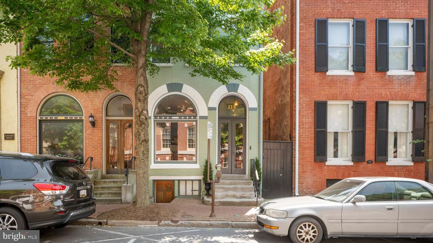 Reintroducing 114 East Church Street; the owners have relocated out of state and have had much interior painting and deep cleaning completed after the move-out to make this home move-in perfect for the next owners. DBO zoning allows flexibility of use; this Circa 1895 beautifully restored TH also has off-street parking! Completely updated, this TH features a custom kitchen with commercial range, high end appliances, plenty of storage and opens to the family room with French doors leading to a professionally designed and planted rear garden with water feature. Both the kitchen and family rooms offer heated floors. There is room for everyone in this 5 BR 3.5 bath home, with the original open staircase, central air and a both gas heat and forced air heat keeping all levels and all corners of this home comfortable year-round.  Located in the heart of the Historic District, this home is walkable to all things downtown Frederick including Carroll Creek, shops, restaurants, and parks.  Leave the car at home and enjoy walking the award-winning historic downtown Frederick! NOTE: county tax record square footage is incorrect actual square footage on seller's purchase appraisal is 3708 finished Sq ft above grade