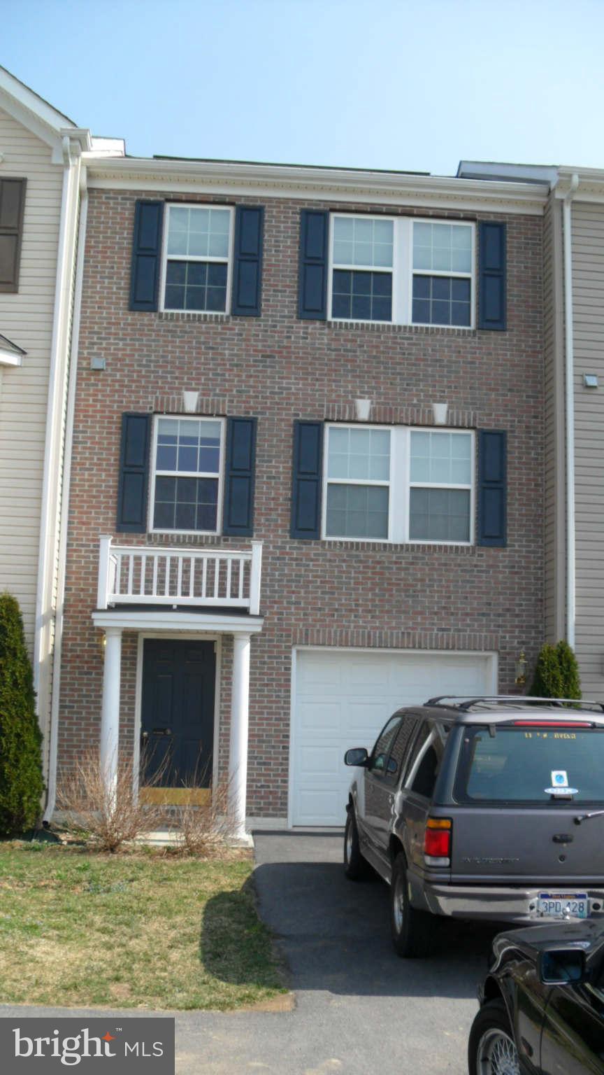Looking for a low maintenance home and lifestyle? Then this 3 level town home with 3 bedrooms 2.5 baths and 1 car garage with morning room extension is what you are looking for! Huge lower level rec room,that is already framed to be finished. Family room on main level. Hugh master suite. Large 2nd level Deck with steps down to the yard. New wood flooring throughout. Home warranty included.
