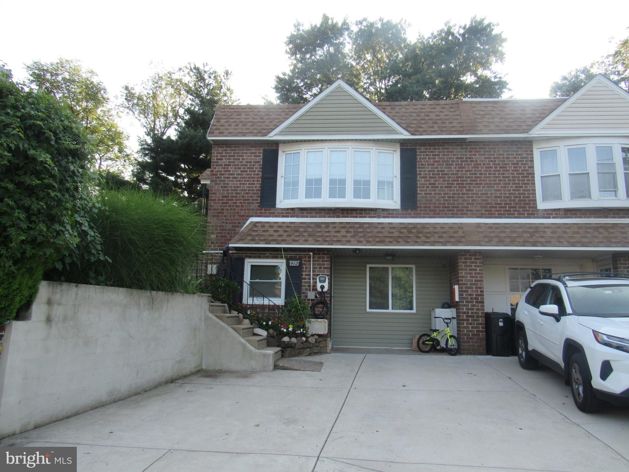 Welcome home to 412 Avon Pl a hidden gem located in much desired Somerton section of Phila.. This beautiful twin rancher with an oversized yard has an updated kitchen, bathrooms, Hot water heater and HVAC system.. The main floor is an open concept with hardwood floors throughout with kitchen, dining area and living room all together.. The bathroom has been updated and two ample size rooms with a deck attached to the master bedroom.. Downstairs you will find hardwood flooring with large renovated full bath with another bedroom.. The garage has been knocked thru and this large downstairs area is fully finished with so many possibilities to make it your own.. The downstairs door leads to an oversized yard with a shed and plenty of room for a garden or play area.. The driveway holds up to 4 cars and has a entrance to the basement.. The driveway has an electric line hook up so you can charge your EV car right from your own driveway.. This home truly offers so much with the updated interior and the beautiful landscaped yard you wont find another home like this.. Schedule your private tour today before this one is sold...